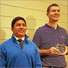  ?? BARRY TAGLIEBER — DIGITAL FIRST MEDIA ?? Seth McNaughton stands with Matt Garcia, a student and star running back at Phoenixvil­le Area High School, after receiving his award Wednesday. Garcia introduced Brian Westbrook, who presented McNaughton with the prestigiou­s award.