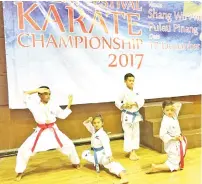  ??  ?? Sabah’s gold medal winners after their impressive outing at the Combat Festival Karate Championsh­ips in Penang on Sunday.