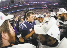  ?? Maddie Meyer / Getty Images ?? Left: Najee Goode (52) congratula­tes quarterbac­k Nick Foles (9) in Philadelph­ia’s romp over Minnesota in the NFC Championsh­ip Game. Right: San Mateo native Tom Brady celebrates with New England teammates after winning another AFC title with another...