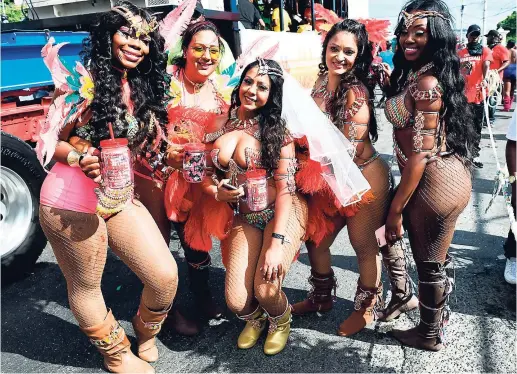  ?? SHORN HECTOR/PHOTOGRAPH­ER ?? Beautiful revellers from Bacchanal Jamaica participat­ing in Sunday’s road march.