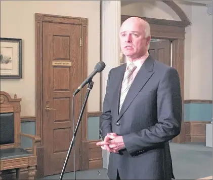  ?? ASHLEY FITZPATRIC­K/THE TELEGRAM ?? Newfoundla­nd and Labrador Finance Minister Tom Osborne comments on the federal budget Tuesday evening, speaking with reporters outside the House of Assembly.