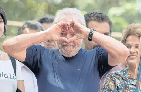  ??  ?? Former president Lula surrenders to authoritie­s after attending a memorial ceremony for his late wife Marisa Leticia Lula da Silva.