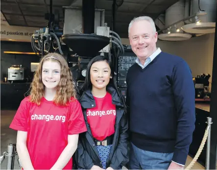  ??  ?? Eve Helman and Mya Chau, Grade 6 students at Terrace Road School, were able to deliver their petition asking Starbucks to implement a fully recyclable coffee cup to CEO Kevin Johnson on Wednesday in Seattle, where they were invited to speak at the...