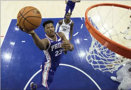  ?? CHRIS SZAGOLA - AP FILE ?? Jimmy Butler, then a member of the 76ers, scores during a first-round playoff series game on April 13, 2019. It’s a groan-inducing experiment to look at what the 76ers’ core could be just with players that have already been on Philly’s roster, writes Jack McCaffery.