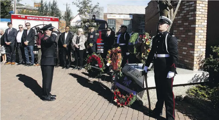  ?? TOM BRAID ?? Wreaths are laid at the Edmonton Firefighte­rs Memorial Plaza in Old Strathcona every Sept. 11, recognizin­g Edmonton firefighte­rs who gave their lives in the line of duty.