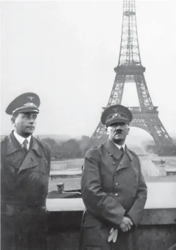  ??  ?? Speer and Hitler on a photo-opportunit­y visit to Paris, 23rd June 1940. The Führer’s favourite architectu­re adviser would later become the Reich’s war economy chief