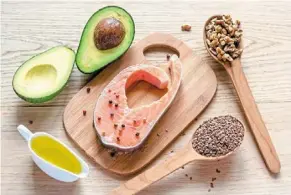  ?? — AFP ?? (above) Foods with fat are not only essential to our health due to the crucial roles fat plays in our body, but also helps us to keep full for longer.