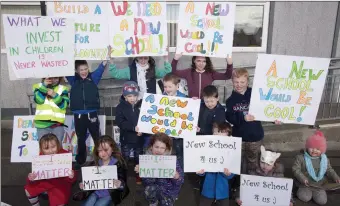  ??  ?? Children joined Saturday’s march in Collooney to protest about the Government’s refusal to grant them a new school. Pics: Carl Brennan.