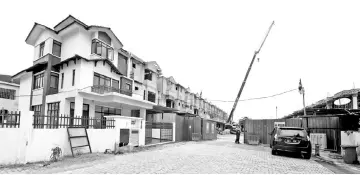  ??  ?? Photo shows a housing project in KL. Property industry players view positively the government’s move to boost their sector, says REHDA. — Bernama photo