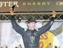  ?? Brian Lawdermilk/Getty Images ?? Kurt Busch celebrates in Victory Lane after winning at Bristol Motor Speedway Saturday night in Tennessee.