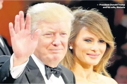  ??  ?? > President Donald Trump and his wife, Melania