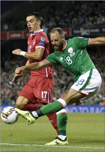  ??  ?? David Meyler of the Republic of Ireland battles for possession with Filip Kostic of Serbia during last week’s World Cup Qualifier in the Aviva Stadium.