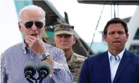  ?? Photograph: Evelyn Hockstein/Reuters ?? Joe Biden with Ron DeSantis in Fort Myers Beach on Wednesday.