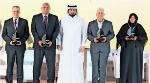  ?? Supplied photo ?? SPREADING KNOWLEDGE: (From left) Mohamed Henna, Mohammed Salman Ibrahim, Sheikh Ahmed bin Mohammed bin Rashid Al Maktoum, Mahmoud Abbas and Zahra bint Salman during the awarding ceremony at the Literacy Challenge Forum on Tuesday. —