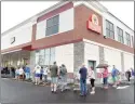  ?? Arnold Gold / Hearst Connecticu­t Media file ?? People line up outside of the new ShopRite in Milford for the opening of the store in 2016.