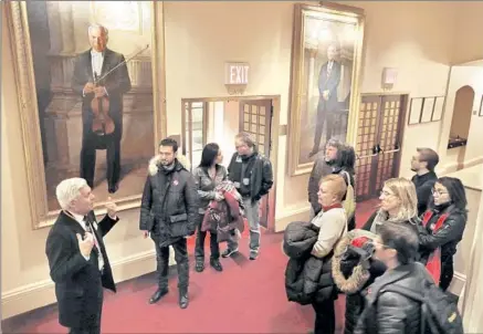  ??  ?? ISAAC STERN, depicted in the portrait at left, helped save Carnegie Hall, as groups learn on tours offered October through June.