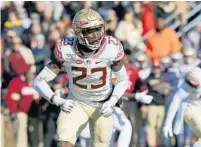  ?? BILL SIKES/AP ?? Florida State will face off against Georgia Tech without senior defensive back Hamsah Nasirildee­n in the lineup due to a knee injury.