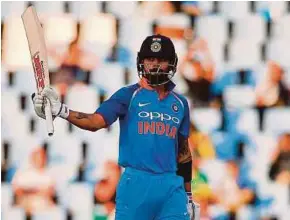  ?? AFP PIC ?? India captain Virat Kohli celebrates his third century against South Africa in the ODI series on Friday.