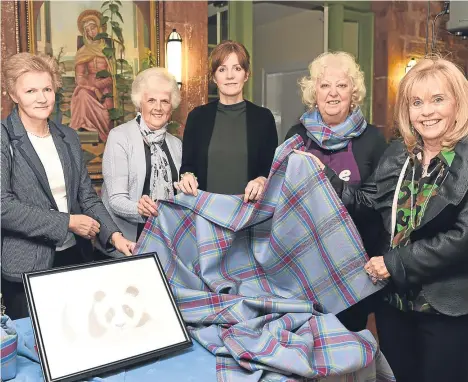  ??  ?? PERTH’S Hope Pregnancy Crisis Centre has launched its own tartan.
People involved with the centre held the launch at a ladies’ evening in Kilgraston School.
Macnaughto­ns made the tartan and Mercury Signs and Designs printed the aprons which were worn...