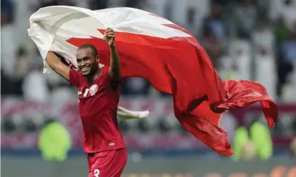  ??  ?? Qatar’s Abdelkarim Hassan celebrates victory over the UAE at the Arabian Gulf Cup last December. Photograph: Karim Jaafar/AFP via Getty Images