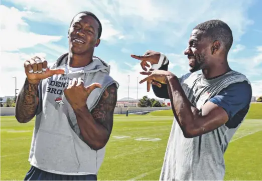  ??  ?? Broncos coach Gary Kubiak says Demaryius Thomas, left, and Emmanuel Sanders are “the best duo I’ve had.”