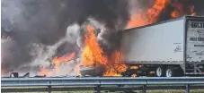  ?? Picture: AP ?? Flames engulf vehicles after a fiery crash along Interstate 75 in Florida that killed seven people.