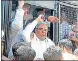  ?? ANI ?? Congress leader Siddaramai­ah detained during a protest.