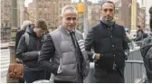  ?? YUKI IWAMURA/AP ?? Fashion designer Thom Browne, center, waits Jan. 9 outside Manhattan federal court in New York.