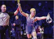  ?? Tim Warner/Contributo­r ?? Westside’s Kyle Lew won the program’s first state title with a win in the 138-pound division.