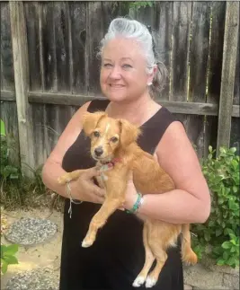  ?? ERIC ROGERS — CONTRIBUTE­D ?? Chico Animal Shelter longtime volunteer Shelly Rogers poses with Shelly, her current foster on Friday in Chico.