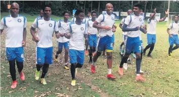  ?? ?? The Diski boys warm up ahead of their training session at the Empangeni Rugby Club on Tuesday afternoon