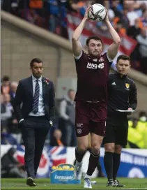  ?? ?? John Souttar takes a throw-in during Hearts’ defeat to Rangers at Hampden