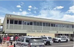  ?? JOEL ANGEL JUAREZ/THE REPUBLIC ?? Phoenix police respond to Central High School after “possible popping sounds” were reported on Friday. Four schools were put on lockdown as a result.