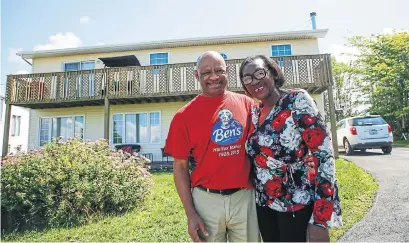  ?? TIM KROCHAK THE CANADIAN PRESS ?? Christophe­r Downey and his wife, Christseli­na, stand in front of their home in North Preston, N.S. Downey said his ancestors were Black Loyalists who fought alongside the British in the War of 1812 on the promise they would be granted legal title to land.