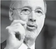  ?? MATT ROURKE/AP 2015 ?? Pennsylvan­ia Gov. Tom Wolf has threatened to block aid to rebellious counties in an escalating political fight over his administra­tion’s handling of the coronaviru­s.
