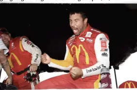  ?? (AP) ?? HISTORY. Bubba Wallace reacts after he is pronounced the winner while waiting out a rain delay before which he was the leader during a NASCAR Cup series auto race Monday, Oct. 4, 2021, in Talladega, Ala.