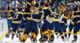  ?? Chris O'Meara/Associated Press ?? Quinnipiac players celebrate after defeating Minnesota during overtime of last season’s national championsh­ip game.