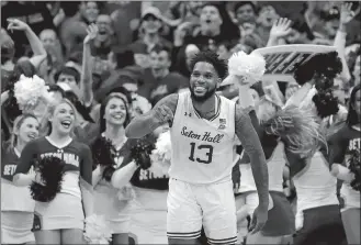  ?? ADAM HUNGER/AP PHOTO ?? In this Nov. 14, 2019, file photo, Seton Hall guard Myles Powell (13) reacts against Michigan State during the second half of a game in Newark, N.J.