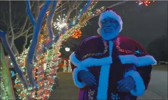  ?? JOHN TULLY — HBO MAX ?? Chris Kennedy became a profession­al Santa Claus after receiving a racist note two years ago demanding he remove the inflatable Black Santa from his front lawn in Little Rock.