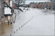  ?? PICTURE: GERARD BINKS. ?? UNDER WATER: The River Ouse in full flood in central York, nearing the record levels which were seen in 2000.