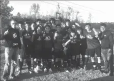  ?? CONTRIBUTE­D PHOTOS ?? Ashworth’s girls (left) and boys (right) soccer teams pose for photos with their FCAA Region Championsh­ip trophies. Ashworth’s girls track team poses for a photo after wining the County Championsh­ip Meet on Wednesday.