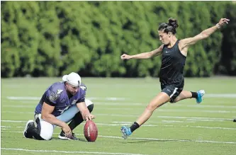  ?? ASSOCIATED PRESS FILE PHOTO ?? Ravens’ Sam Koch holds the ball for Carli Lloyd during a joint NFL practice in Philadelph­ia on Aug. 20.