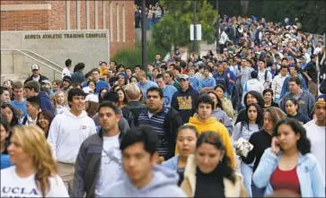  ?? Matt Sayles Associated Press ?? UCLA and other UC campuses are wrestling with how to add students while finding ways to get them to graduate more quickly and hire more faculty in order to help the state meet its workforce needs.