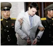  ?? JON CHOL JIN / ASSOCIATED PRESS 2016 ?? American student Otto Warmbier is escorted by guards in March 2016 at the Supreme Court in Pyongyang, North Korea. Warmbier, 22, was in a coma when he was released last week.