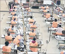  ?? (Pic: UNFPA) ?? Textile workers during a shift. Some of their employers say they cannot afford their pay demand.