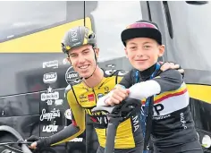  ??  ?? Jumbo-Visma rider Pascal Eenkhoorn and 12-year-old cycling fan Xander Graham.