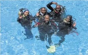  ??  ?? Mzansi Scuba Diving Academy owner and instructor Kholisile Khumalo, front, makes a splash with his students, from left, Nobahle Matshobana, Florina Maleke, Bhekizulu Mpala and Nomthandaz­o Sibiya.