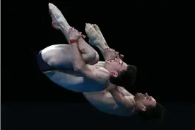  ?? Tom Pennington/Getty Images ?? Tom Daley and Matty Lee competing in the men’s synchronis­ed 10m platform final. Photograph: