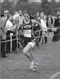  ?? The Sentinel-Record/MARA KUHN ?? Lake Hamilton’s Angel Crawford won the Class 6A girls cross country championsh­ip Saturday with a time of 19 minutes, 27.5 seconds at Oaklawn Park in Hot Springs.