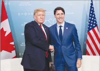  ?? CP PHOTO ?? Prime Minister Justin Trudeau meets with President Donald Trump at the G7 leaders summit in La Malbaie, Que..